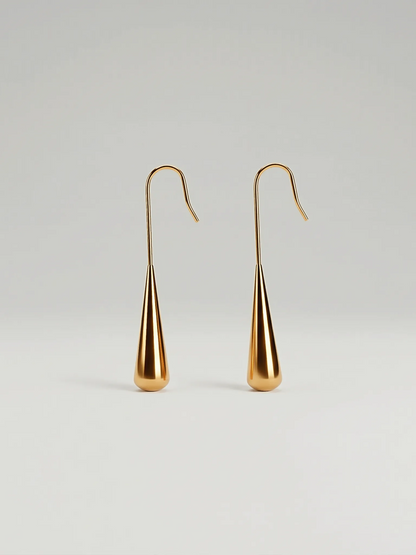 Boucles d'oreilles minimalistes en or 18 carats en forme de goutte d'eau fluide