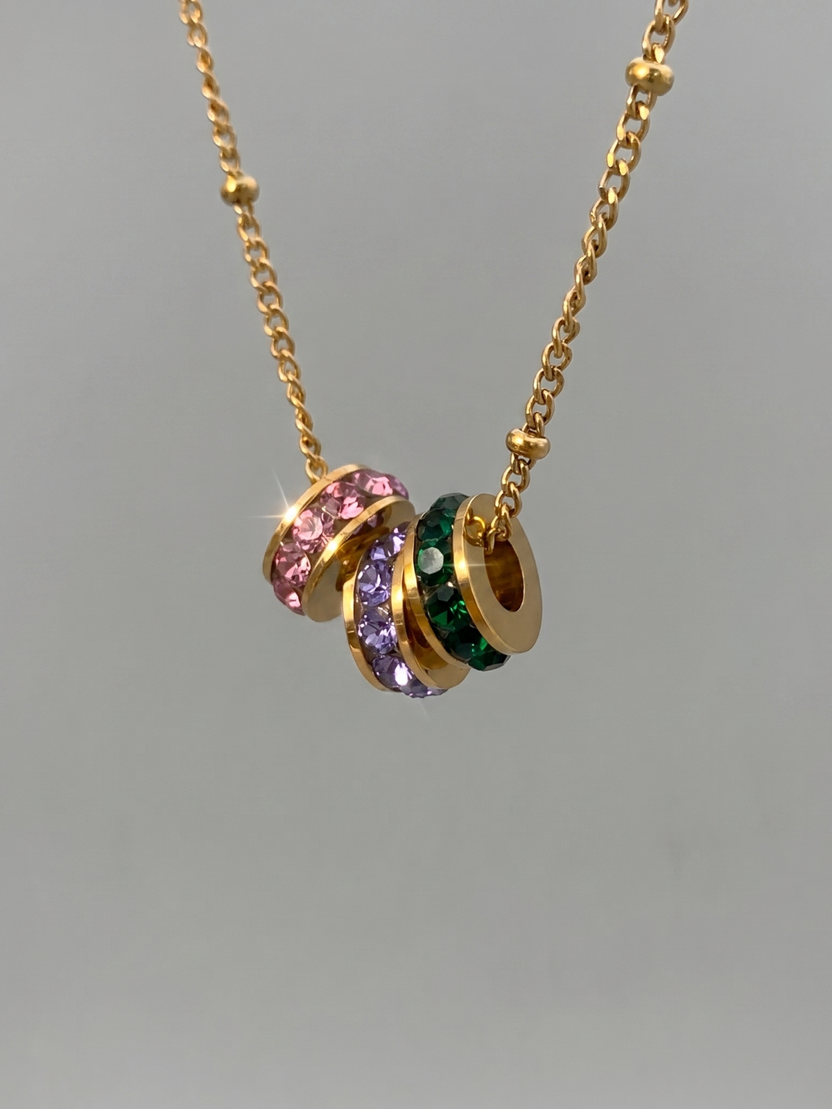 Collier à perles porte-bonheur trois tons or 18 carats