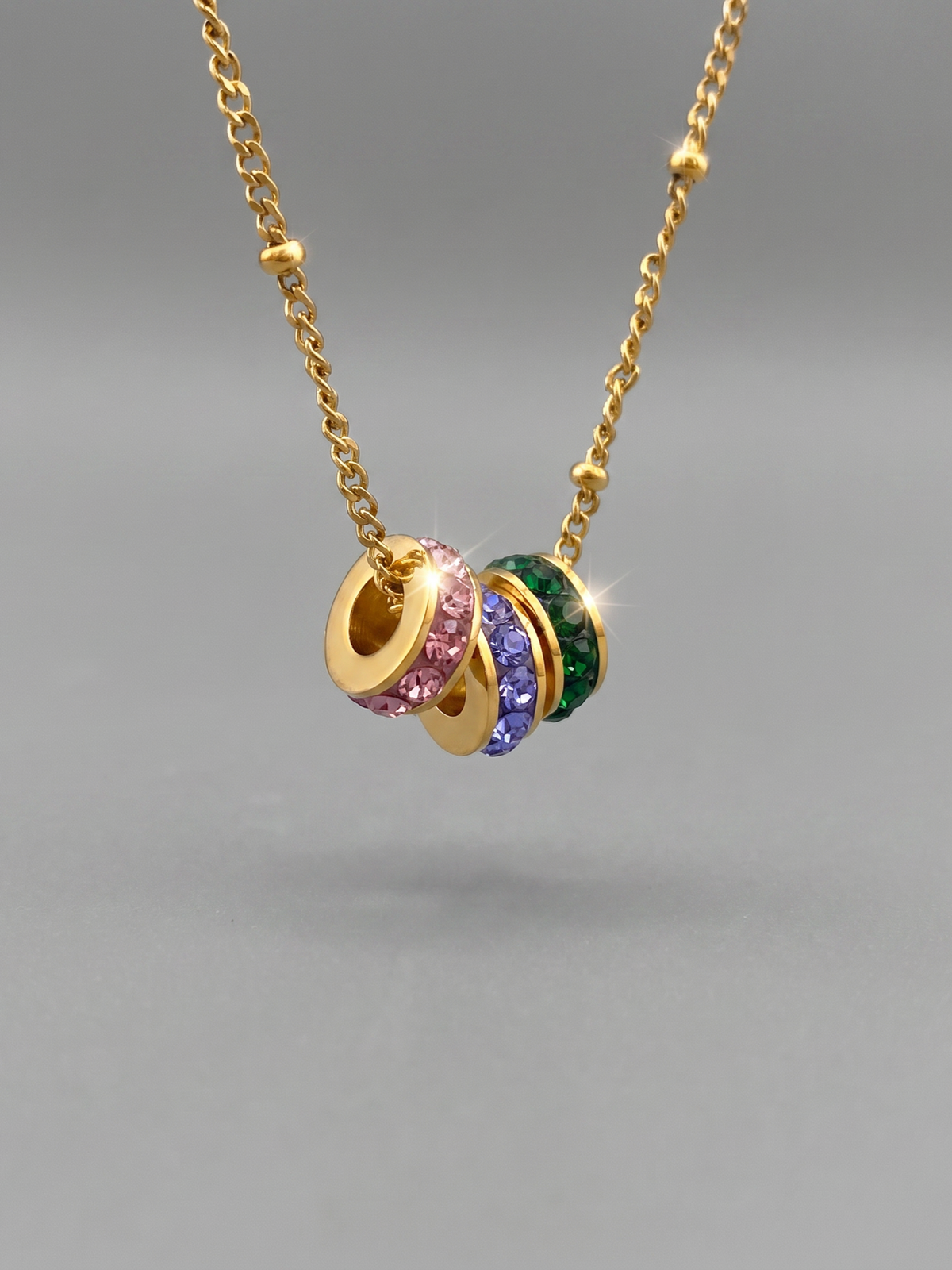 Collier à perles porte-bonheur trois tons or 18 carats
