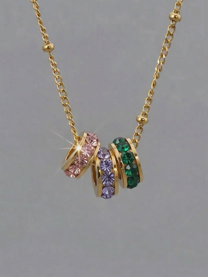 Collier à perles porte-bonheur trois tons or 18 carats