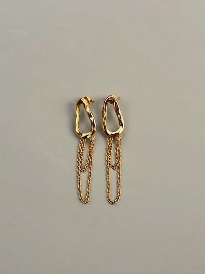 Boucles d'oreilles à glands dorés liquides texturés
